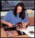 Gail Tilden preparing magazine spreads at Nintendo Power