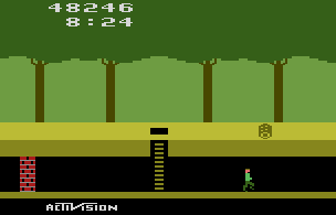 A screenshot of Pitfall for Atari 2600. Harry is running to the right. To his left is a ladder back to the surface, and a brick wall. On the surface is a log.