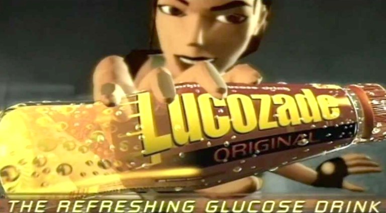 A screengrab of a Lucozade energy drink ad featuring Lara Croft holding the bottle.