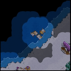 A screenshot of the Warcraft II fog of war in action.